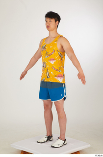  Lan a poses blue shorts dressed sports standing white sneakers whole body yellow printed tank top 0002.jpg